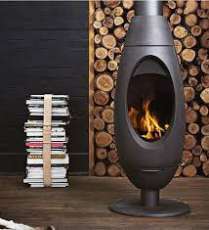 Печь-камин Invicta OVE стальная в интерьере Амазонка бай фото в Барановичах