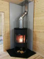 Недорогой камин с отделкой шамотом Сибирь 12 фото в интерьере в Барановичах