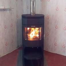 Недорогой камин с отделкой шамотом Сибирь 12 фото в интерьере в Барановичах