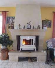 Печь-камин чугунный Invicta Bradford в интерьере Амазонка бай фото в Барановичах