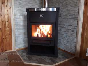 Стальной недорогой камин Теплодар ОВ-120 (угловой) фото в интерьере в Барановичах