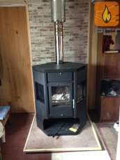 Отопительная печь-камин Сибирь 15 фото в интерьере в Барановичах