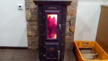 Стальная печь Термофор Статика Тетра, чёрная бронза фото в интерьере в Барановичах