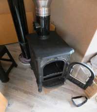 Недорогой печь-камин со стеклом Сибирь 6 фото в интерьере в Барановичах