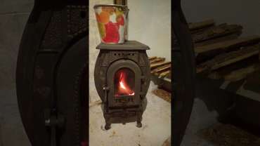 Печь отопительно-варочная чугунная "Сибирь" фото в интерьере в Барановичах