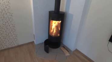 Стильная печь-камин с шамотом Мета-Бел Селигер в Барановичах фото в интерьере в Барановичах