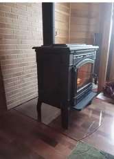 Печь-камин чугунный FireWay Gunter в интерьере чёрный Амазонка бай фото в Барановичах