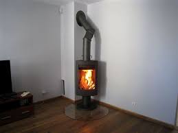 Печь-камин чугунный Invicta Alios в интерьере Амазонка бай фото в Барановичах