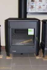 Печь-камин чугунный Invicta Carolo в интерьере Амазонка бай фото  в Барановичах