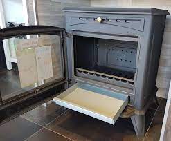 Печь-камин чугунный Invicta Altea в интерьере Амазонка бай фото в Барановичах