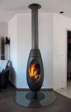 Печь-камин чугунный Invicta Ove в интерьере Амазонка бай фото в Барановичах