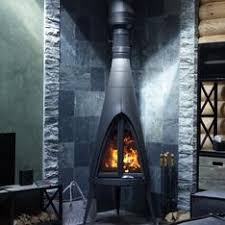 Печь-камин чугунный Invicta Pow-Wow в интерьере Амазонка бай фото в Барановичах